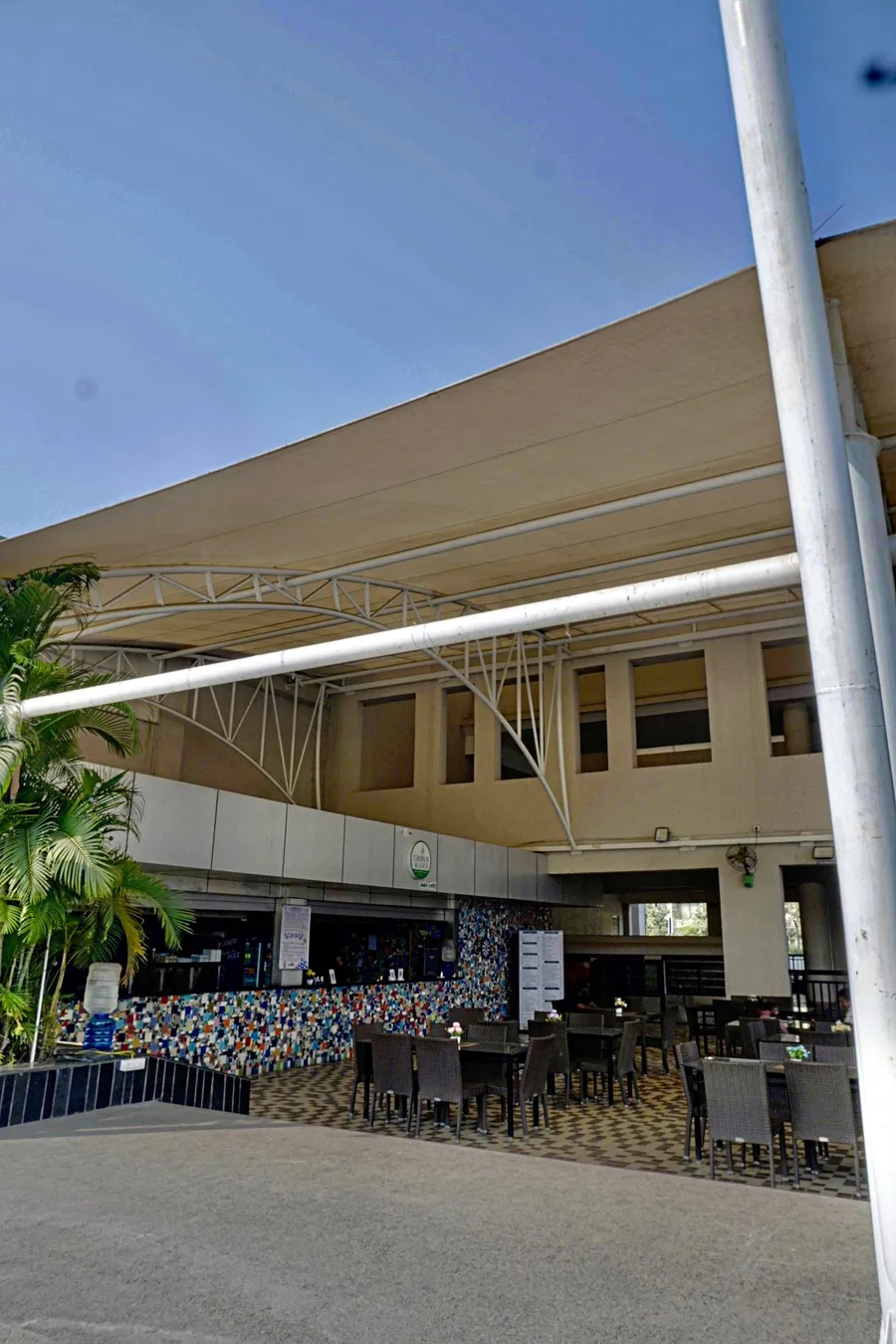 Wide view of the counter and seating at Urban Rasoi